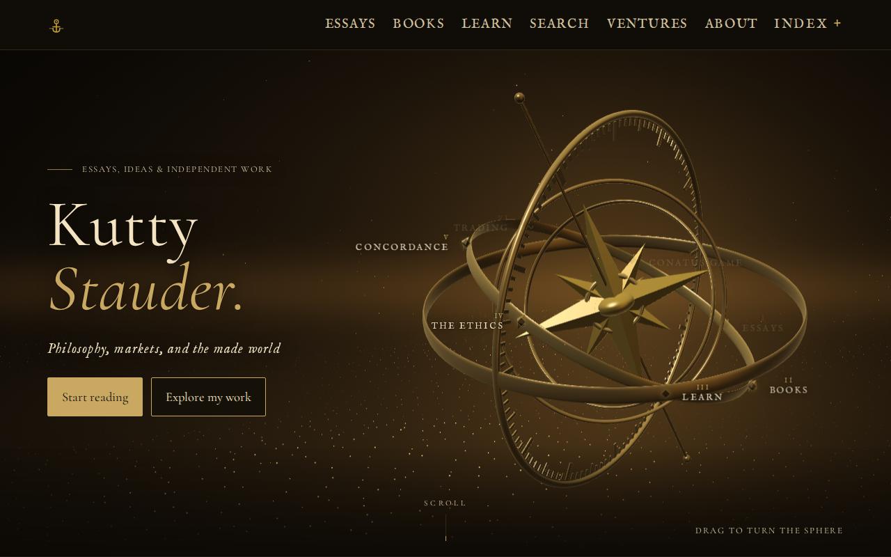 The kuttystauder.com home page: a gold 3D armillary sphere with a compass rose beside the name Kutty Stauder.